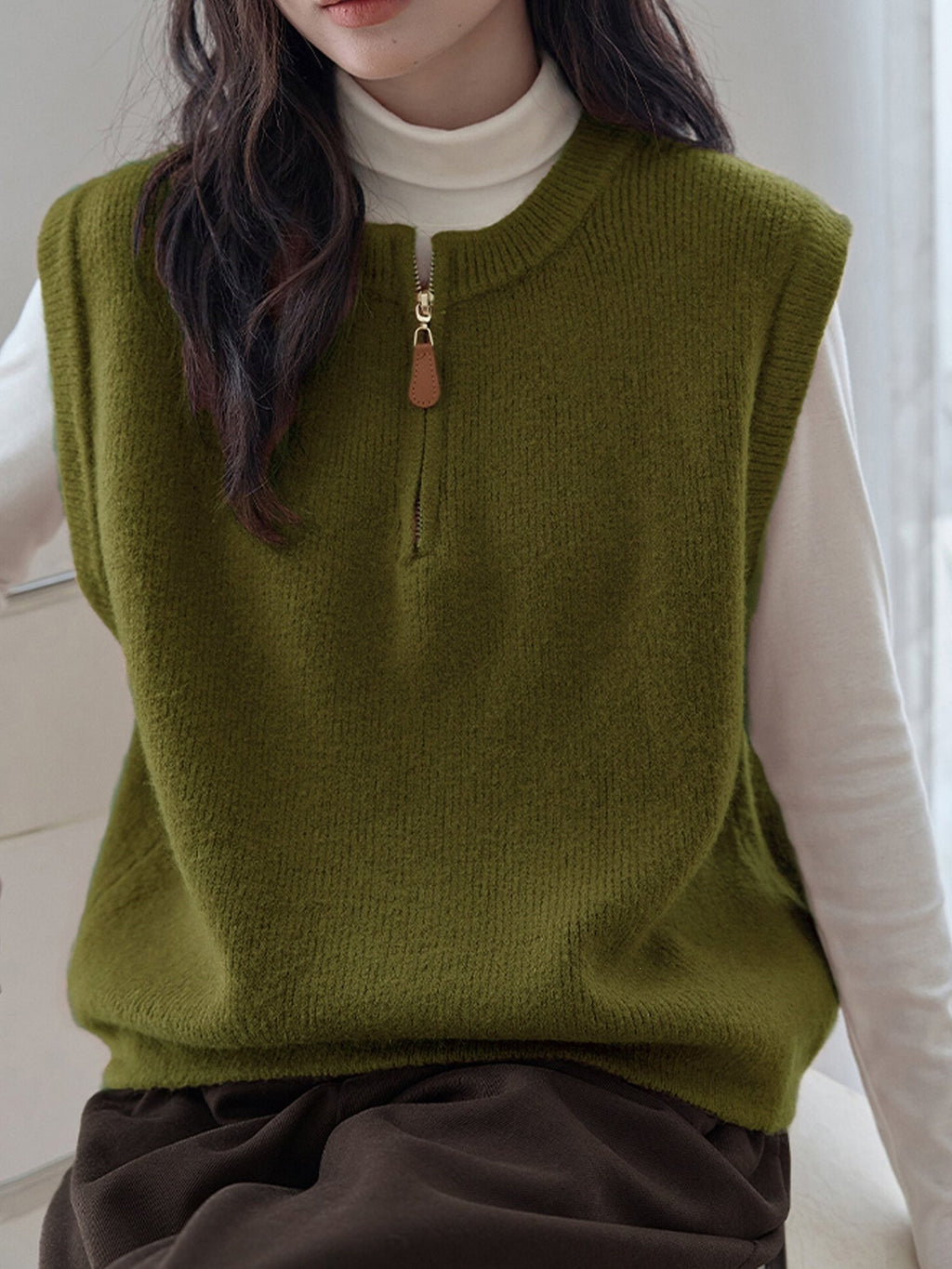Dark Gray Crew-neck Half-zip Knit Vest Layered Over A Gray College-style Sweater Vest