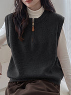 Dark Gray Crew-neck Half-zip Knit Vest Layered Over A Gray College-style Sweater Vest