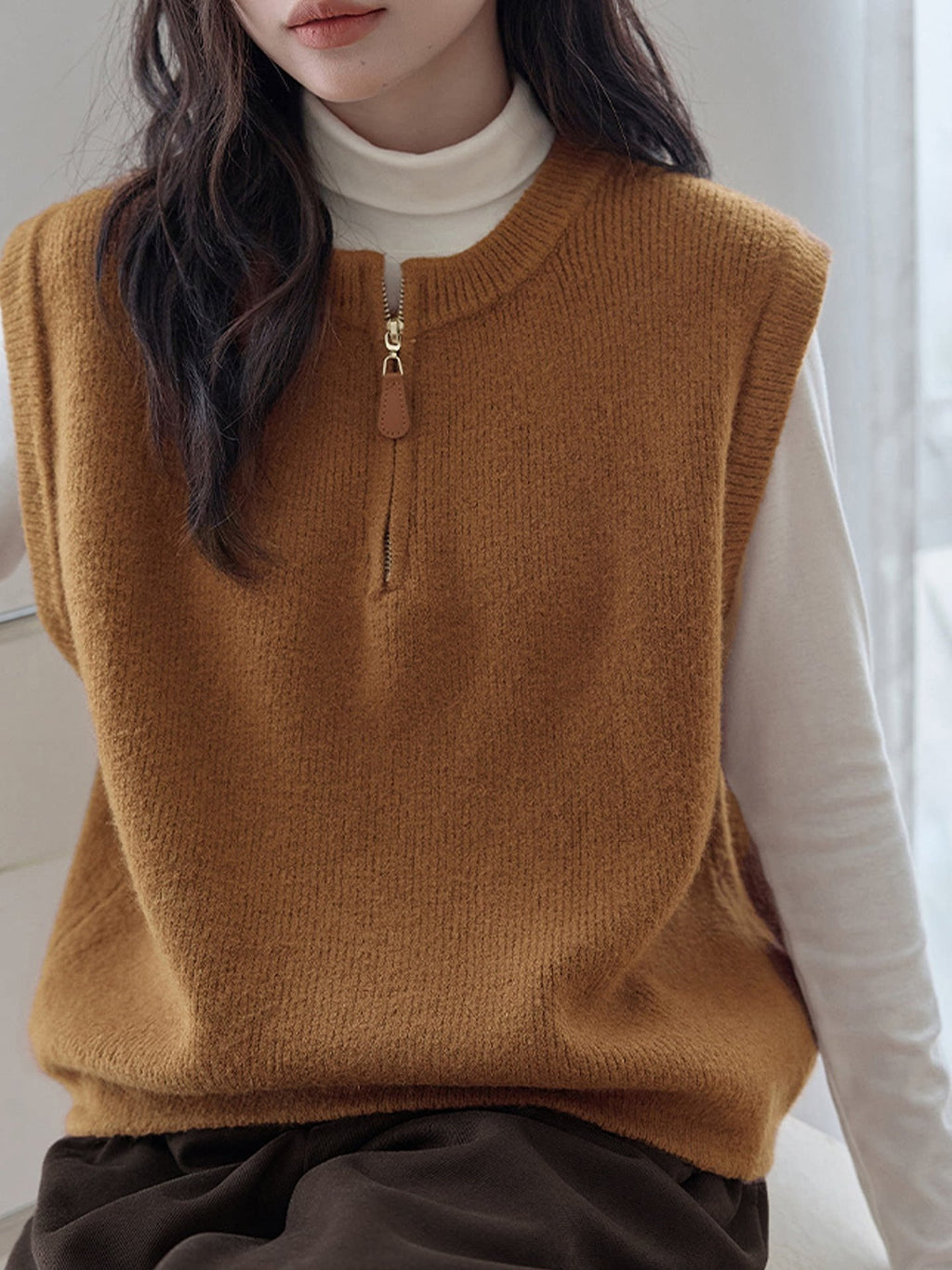 Dark Gray Crew-neck Half-zip Knit Vest Layered Over A Gray College-style Sweater Vest