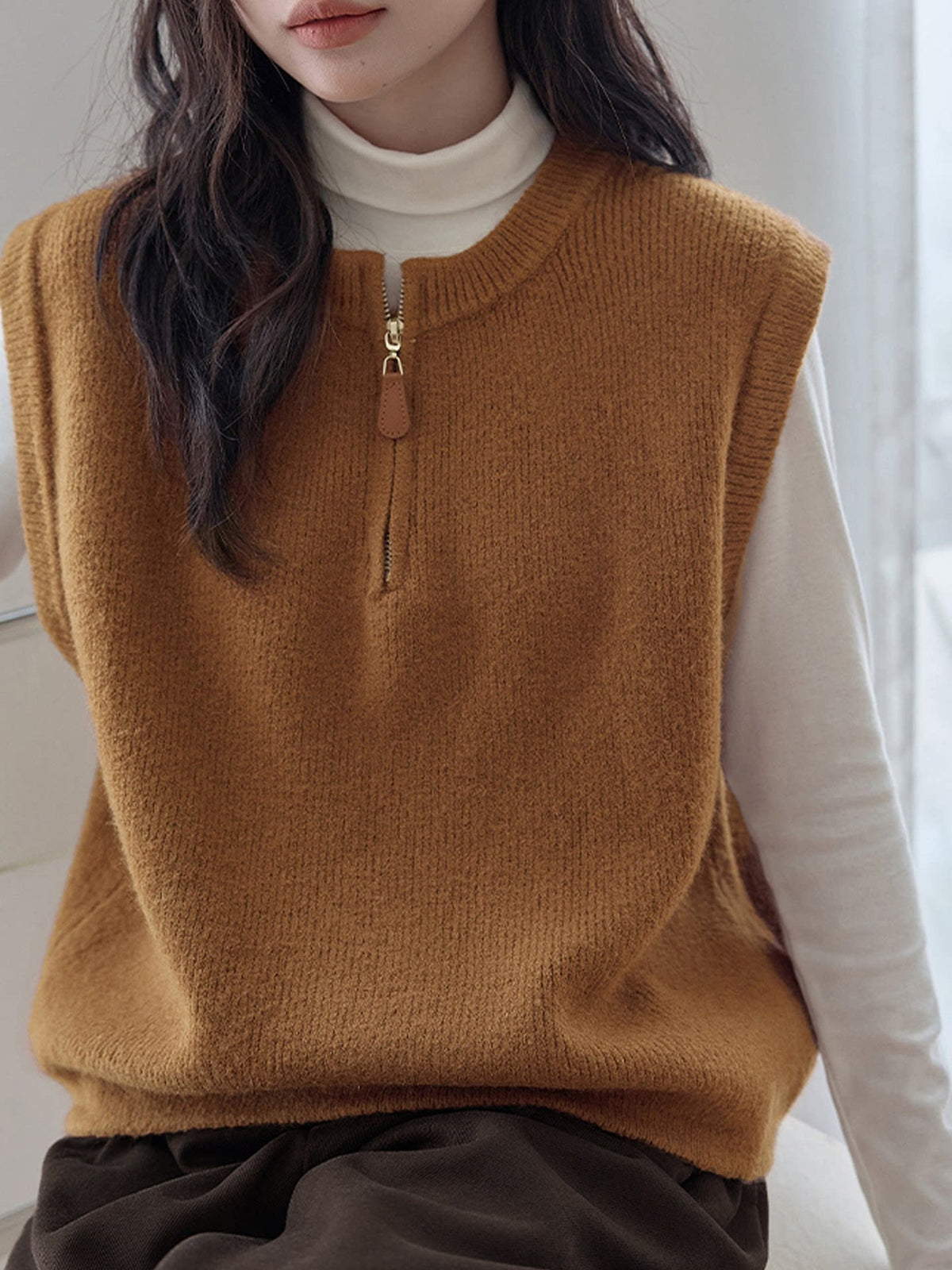 Dark Gray Crew-neck Half-zip Knit Vest Layered Over A Gray College-style Sweater Vest