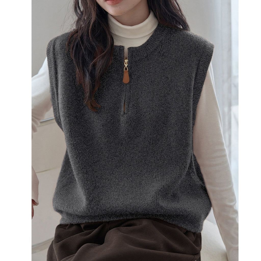 Dark Gray Crew-neck Half-zip Knit Vest Layered Over A Gray College-style Sweater Vest