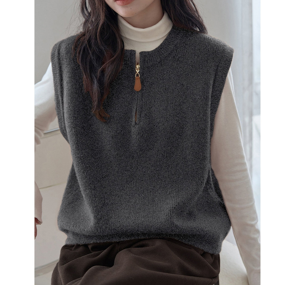 Dark Gray Crew-neck Half-zip Knit Vest Layered Over A Gray College-style Sweater Vest